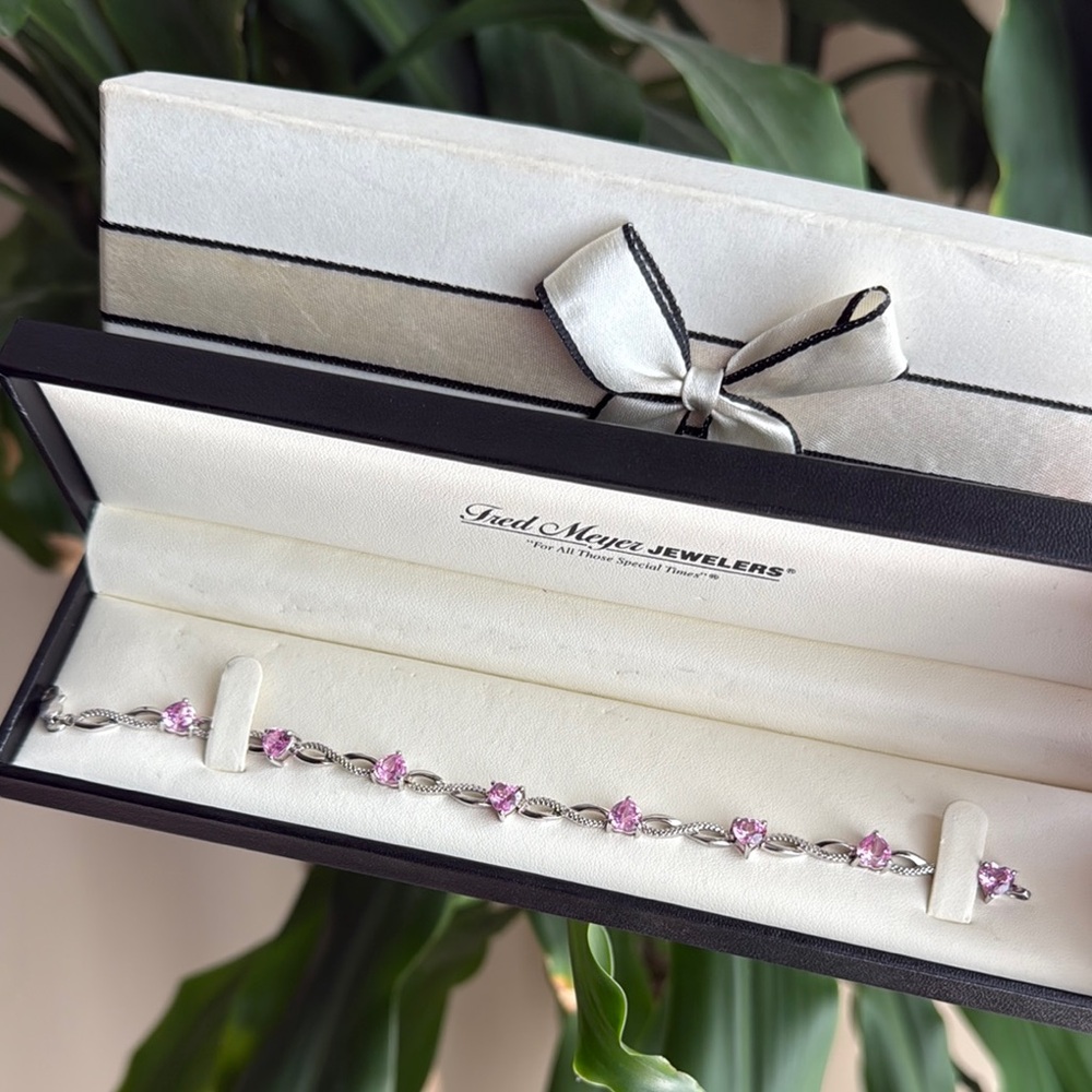 Elegant Silver and Pink Bracelet with Modern Design